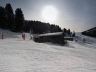 Ski Center Latemar Obereggen- domki przy trasie