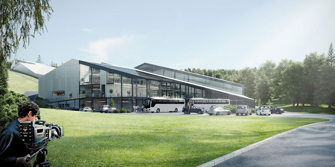 Całoroczny stok narciarski w Babicy – projekt budynku i infrastruktury zewnętrznej wizualizacja: Nowoczesny, przeszklony budynek całorocznej hali narciarskiej w Babicy z parkingiem, autokarami i zielonym otoczeniem.