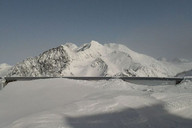 Maso Corto narty w lutym. Widok z zasypanego tarasu.