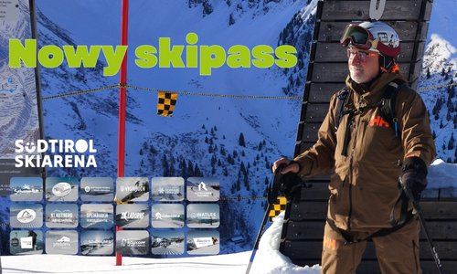 Męszczyzna w brązowej kurtce narciarskiej na tle zacienionych gór, po jego lewej stronie napisy Nowy skipass, susdtirol skiarena i logotypy 18 ośrodków narciarskich Nowy Skipass - Südtirol Skiarena rzuca wyzwanie gigantom